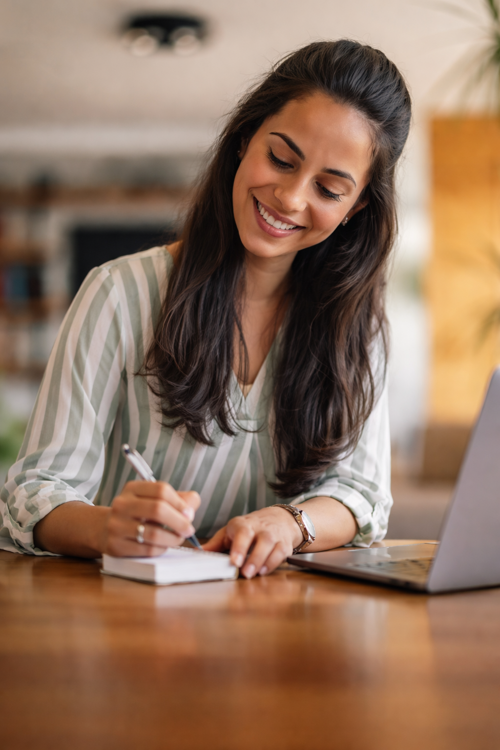 Woman teaching with laptop